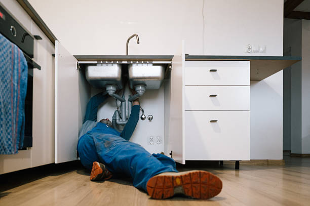 Professional Plumbing technician working in Carmel, IN